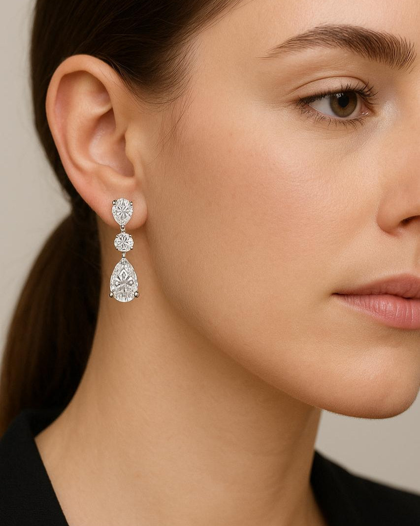 Pear Earrings (قطرات الندى) 7 Ct